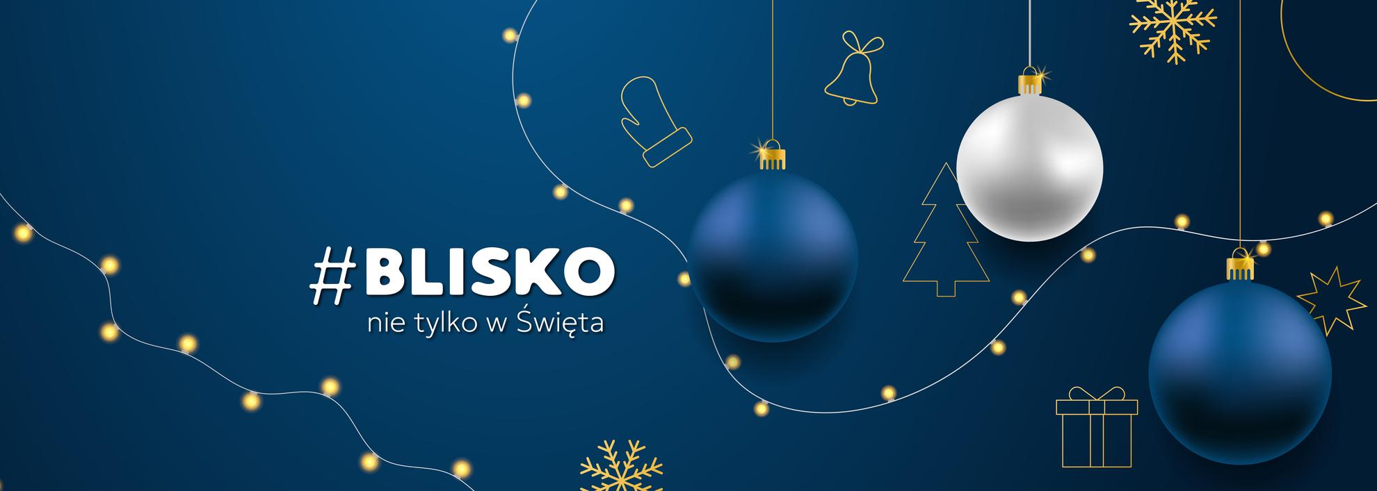 Baner świąteczny przedstawiający bombki i światełka na granatowym tle. W centrym znajduje się napis "#BLICKO nie tylko w święta".